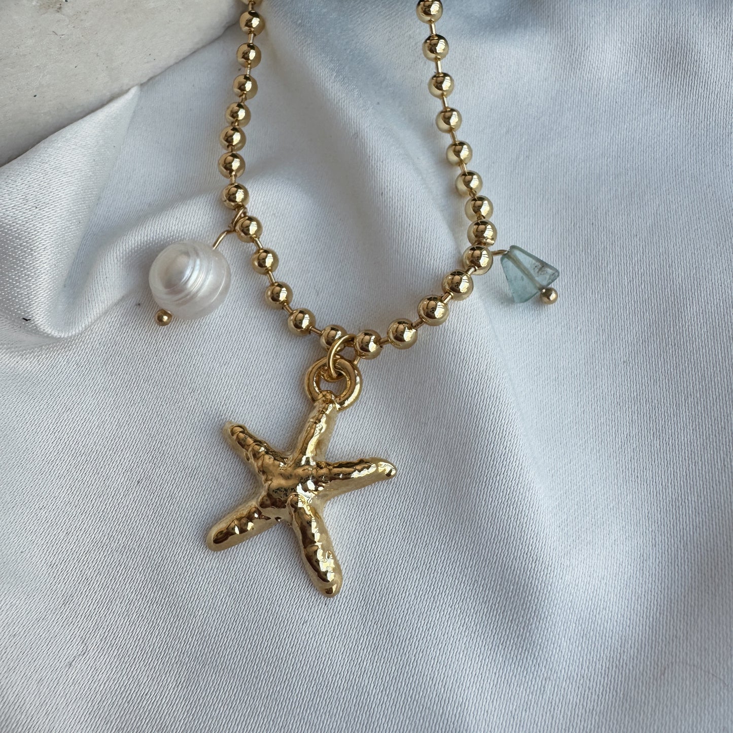 Collar estrella y piedra azul