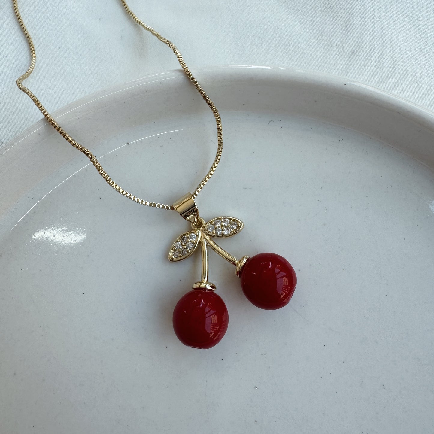 Conjunto de cereza circonia