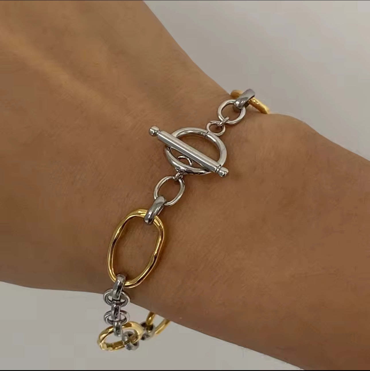Pulsera bicolor broche