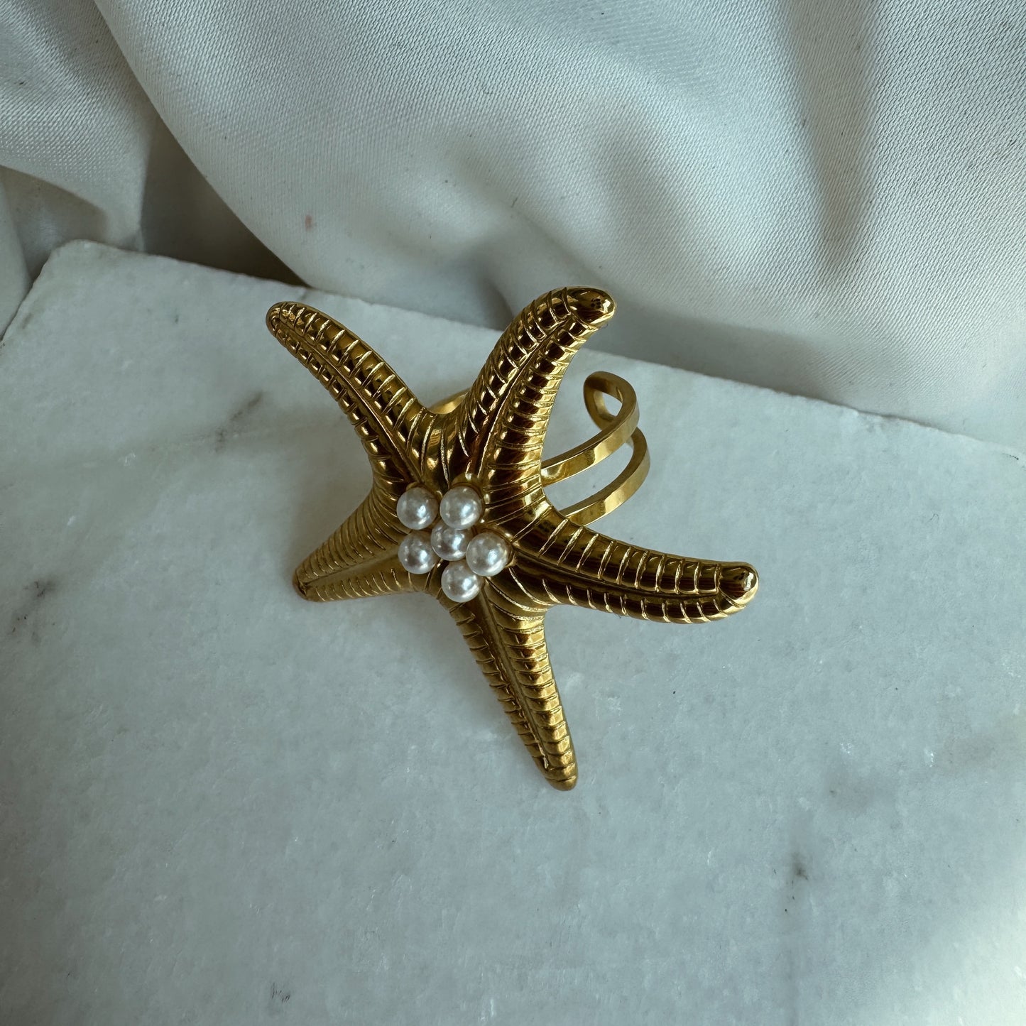 Anillo estrella de mar y perla