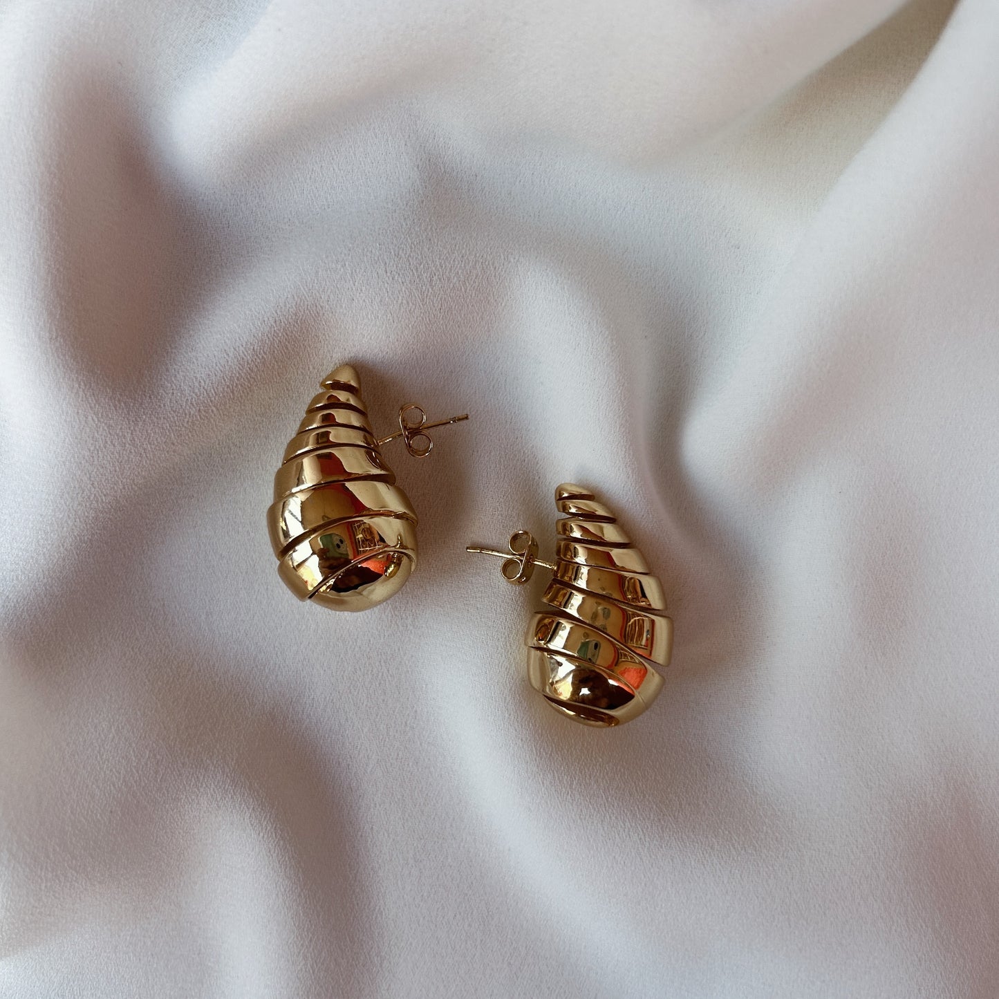 Aretes gota caracol