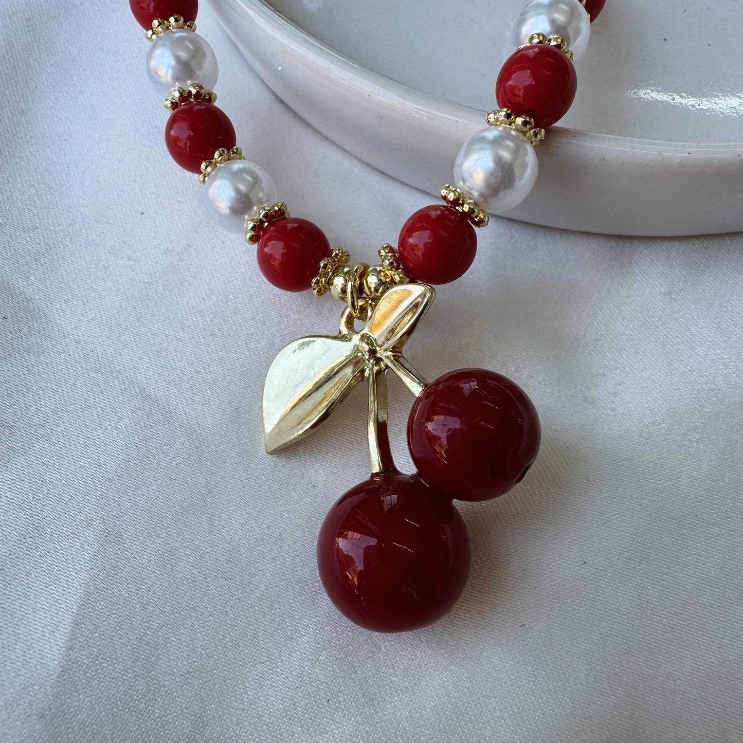 Pulsera perlas y cereza