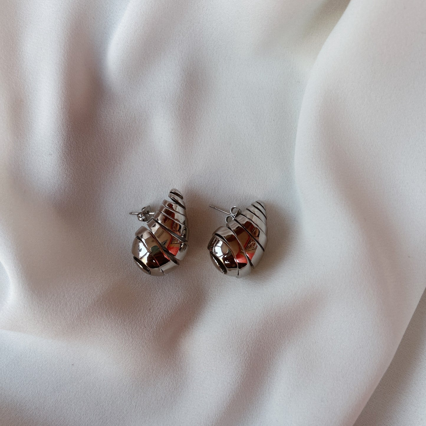 Aretes gota caracol