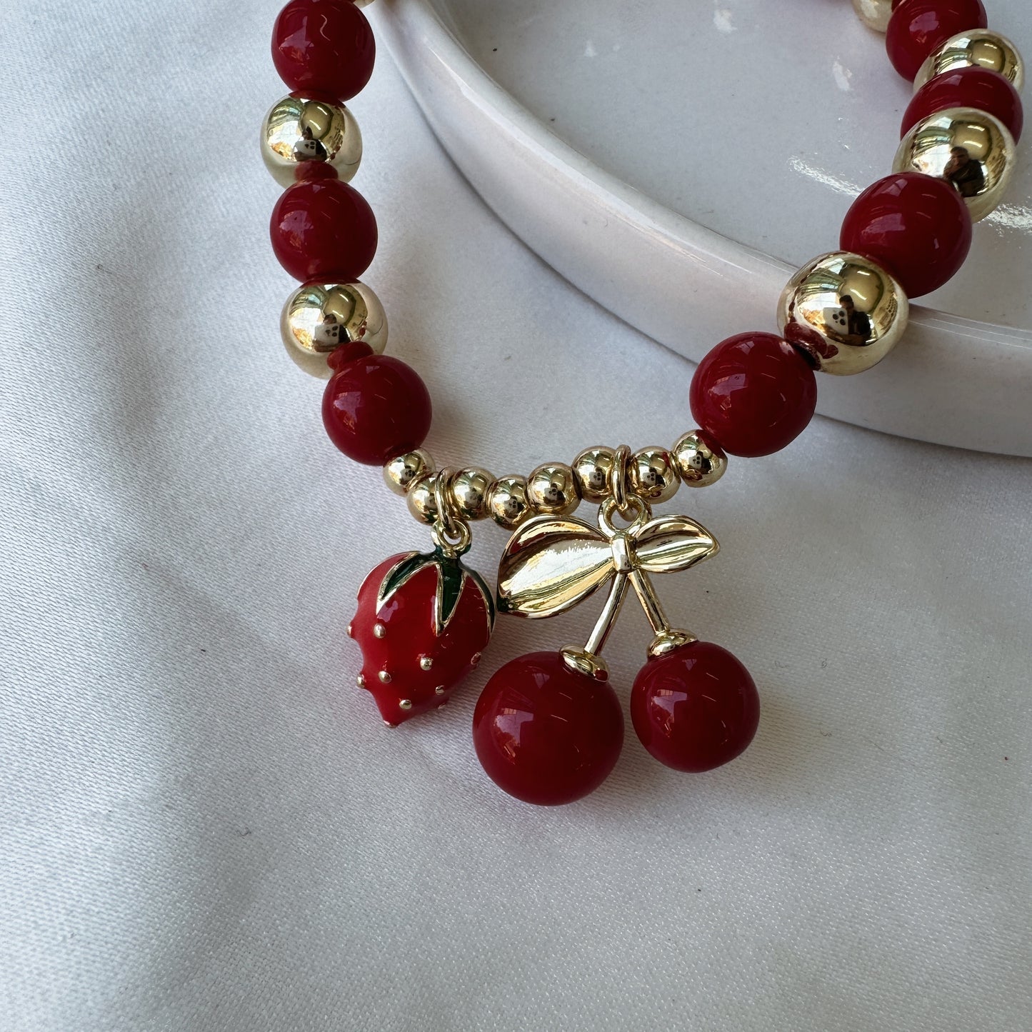 Pulsera fresa y cereza