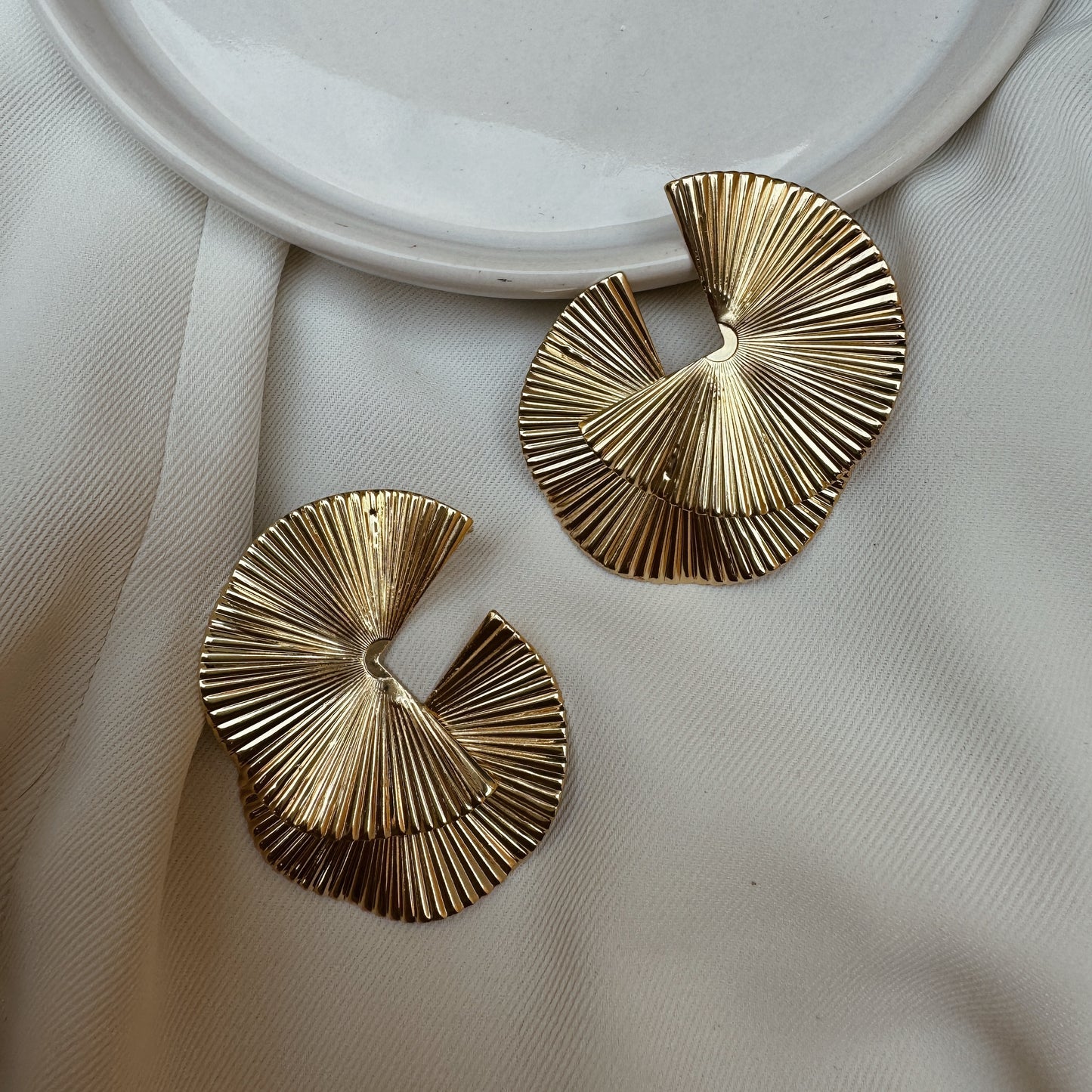 Aretes abanico