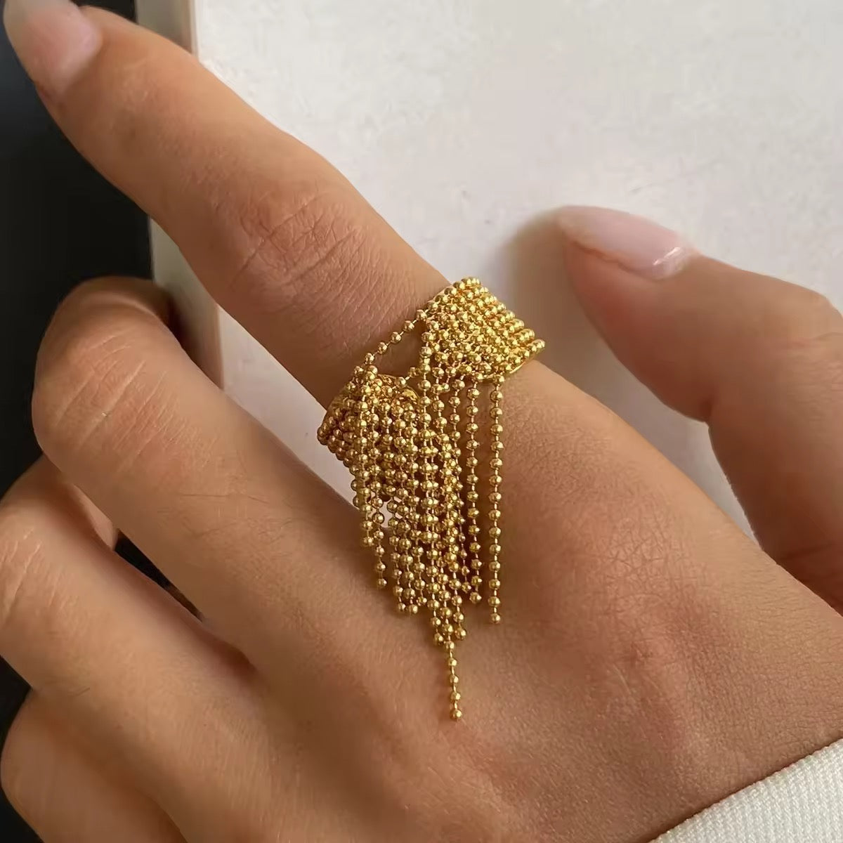 Anillo borla