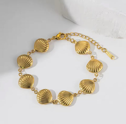 Pulsera conchas