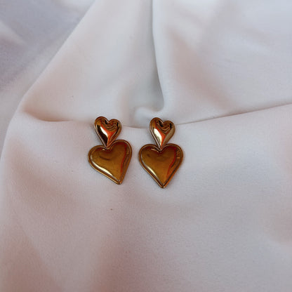 Aretes corazón doble
