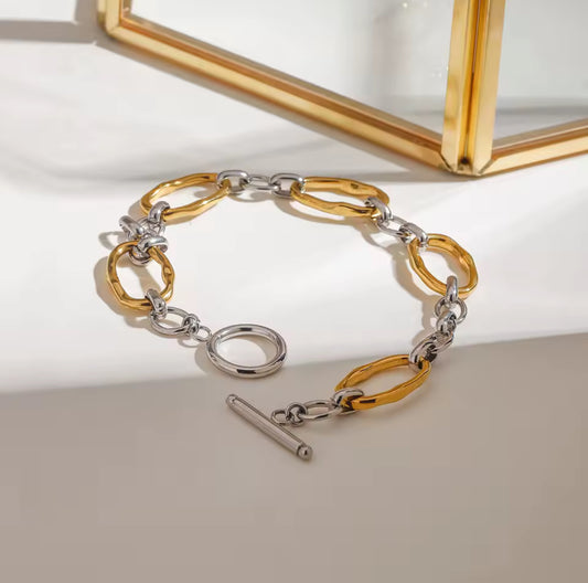 Pulsera bicolor broche