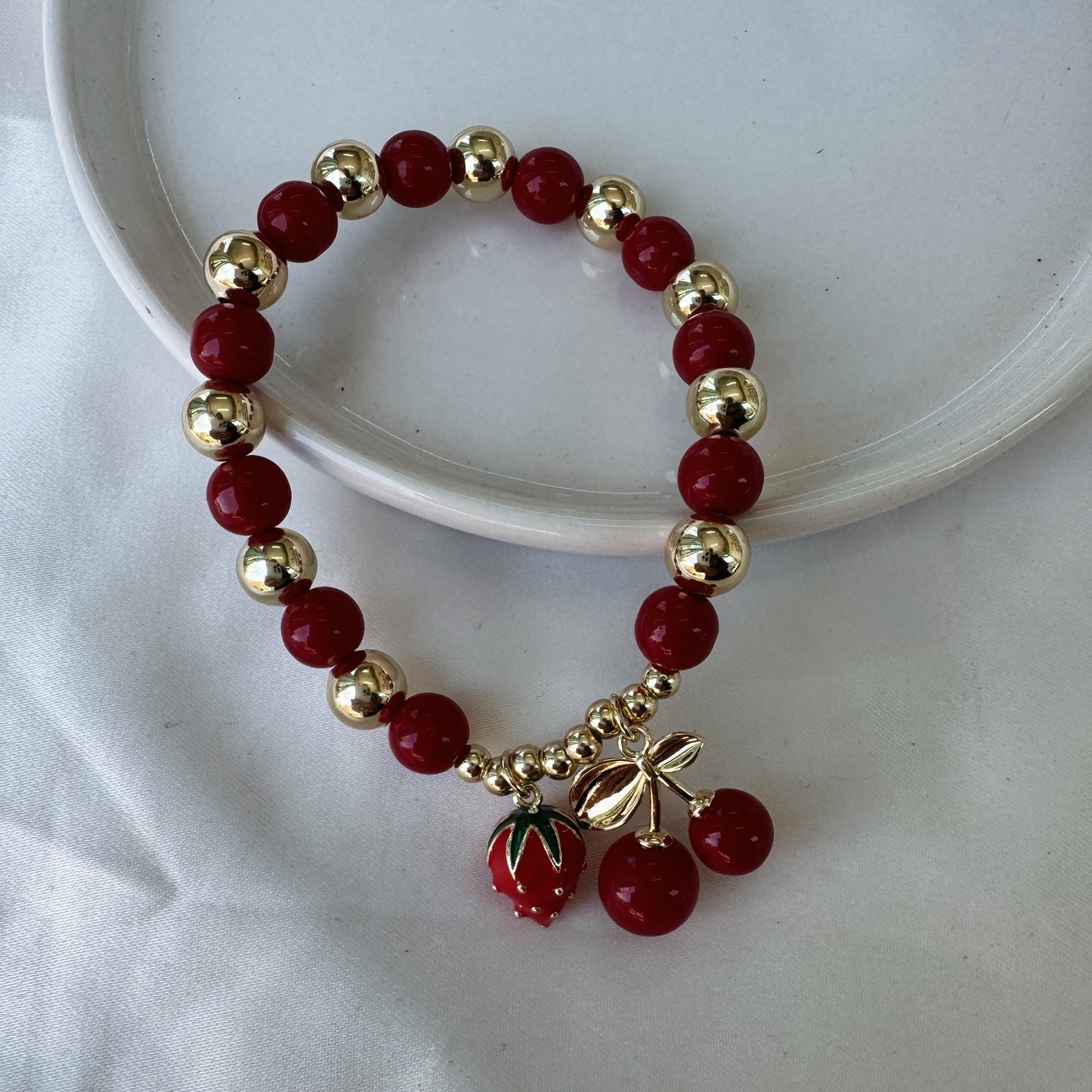 Pulsera fresa y cereza