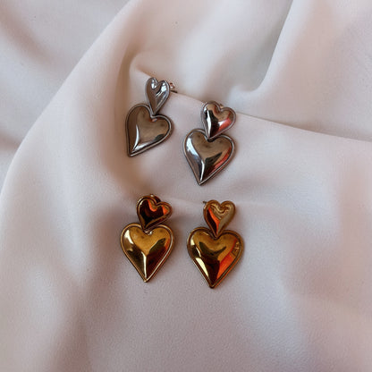 Aretes corazón doble