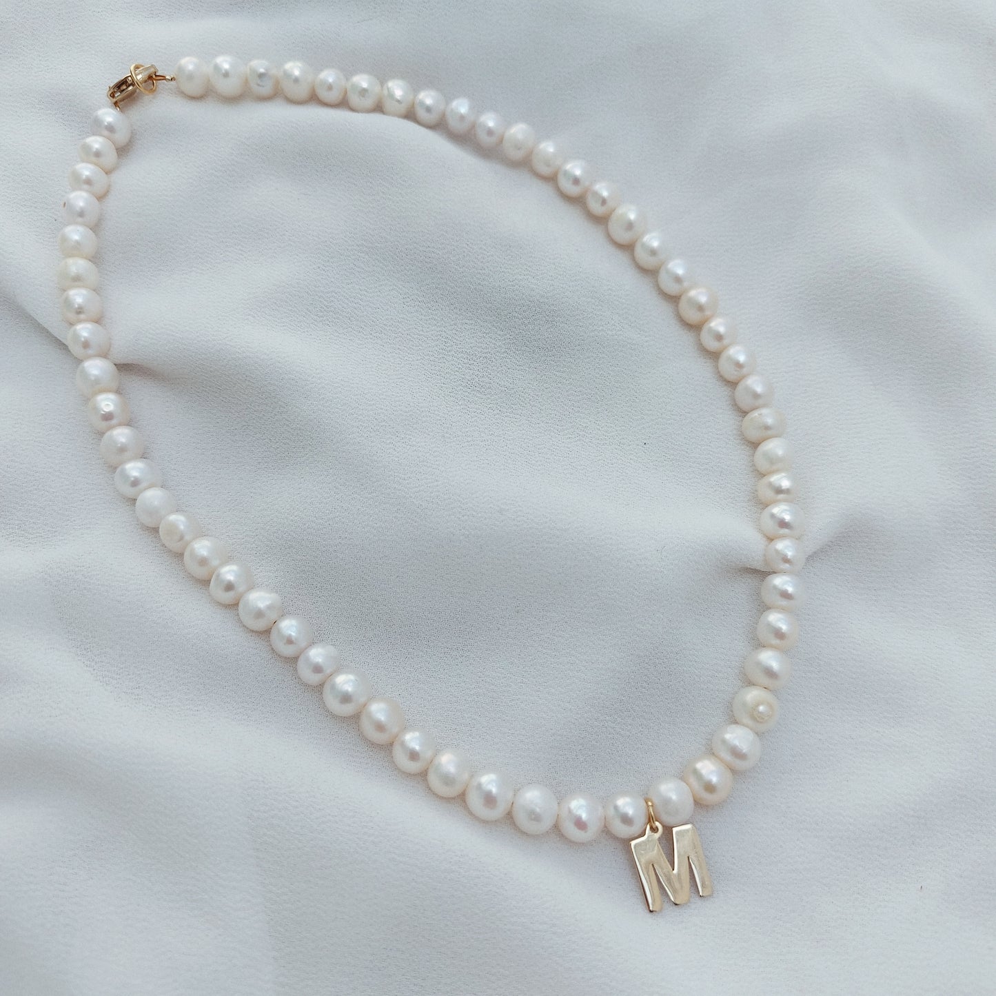 Perlas con inicial