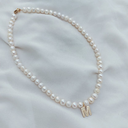 Perlas con inicial