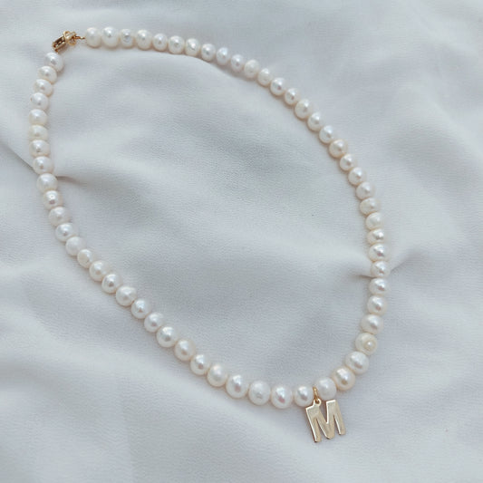 Perlas con inicial